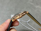 Cartier watch side view, rose-gold case with black leather strap
