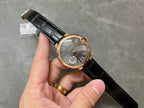 Cartier watch on wrist view, rose-gold case, black leather strap, dark dial with gem