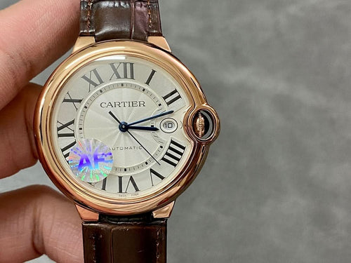 Cartier watch with rose-gold case, white dial, Roman numerals, brown leather strap