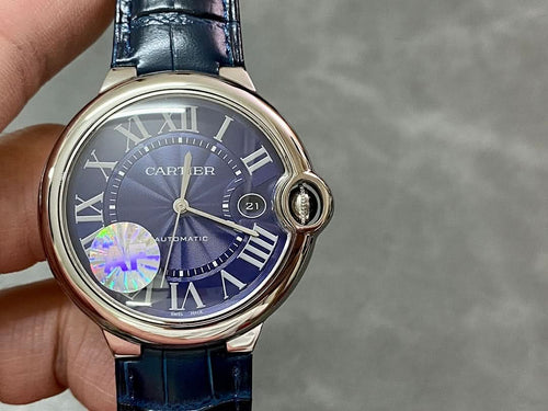 Cartier round wristwatch front with blue dial, Roman numerals, and blue leather strap