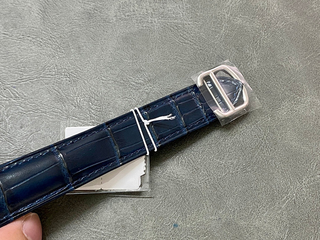 Blue leather watch strap with silver buckle and clasp hardware