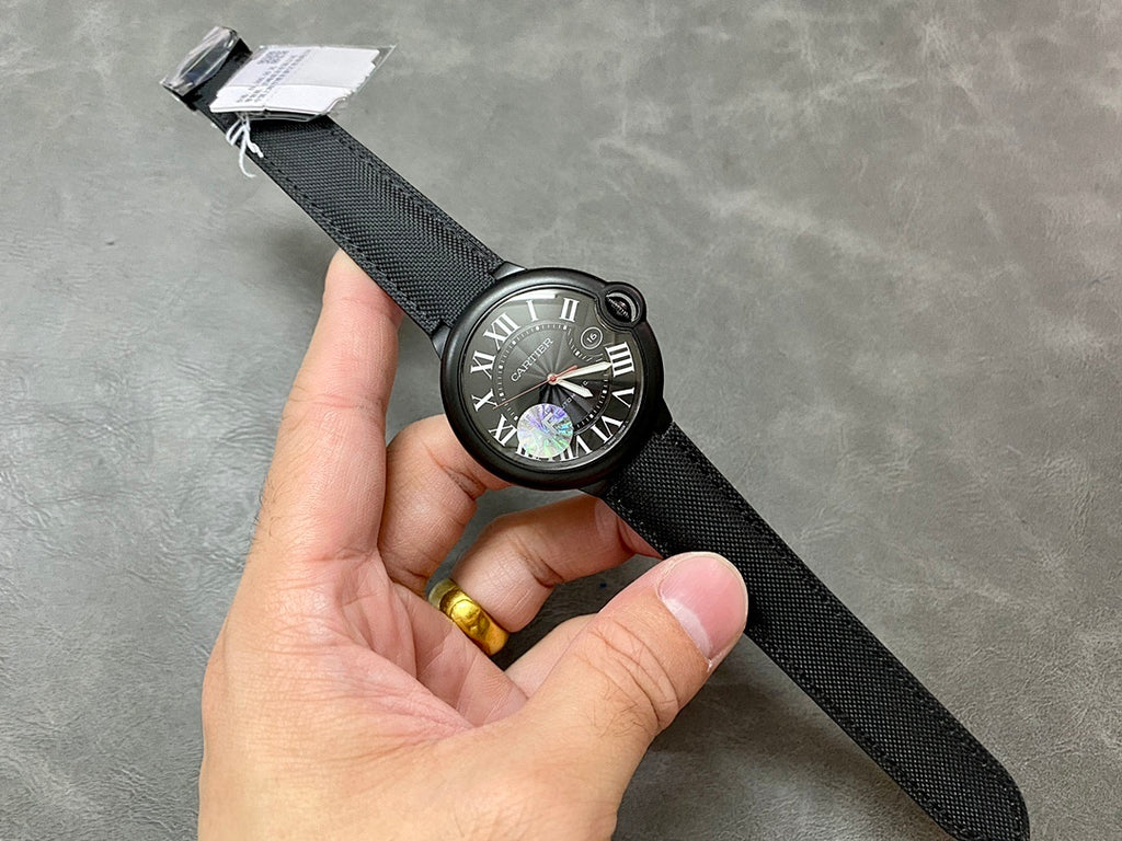 Cartier wristwatch on black strap with clasp and Roman numeral dial