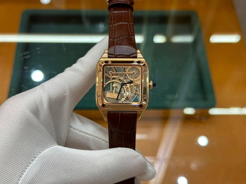 Wristwatch with brown leather strap and gold-tone square case, front view