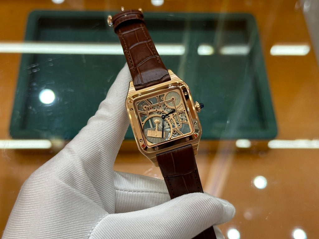 Wristwatch with brown leather strap and gold-tone square case, three-quarter view
