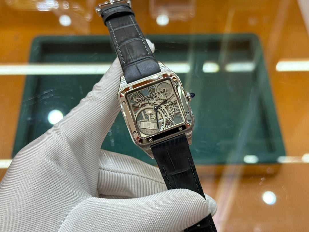 Rectangular skeleton dial wristwatch on black leather strap, angled front view