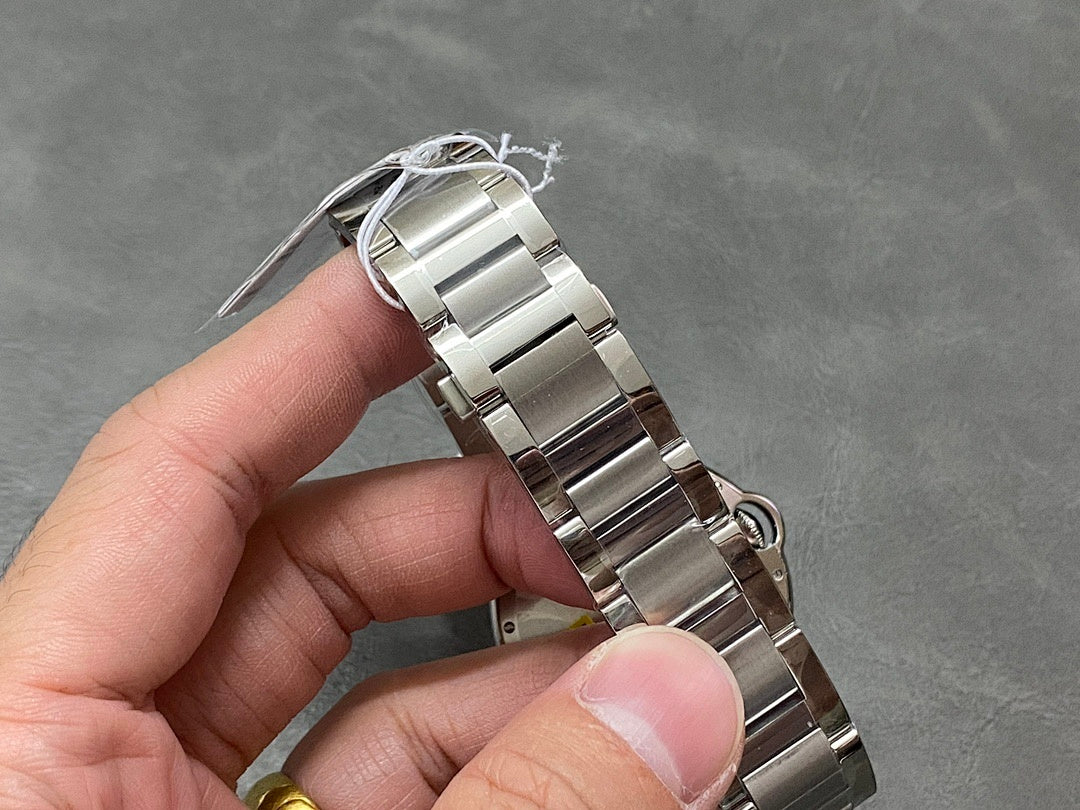 Cartier automatic wristwatch, stainless steel bracelet and curved case view