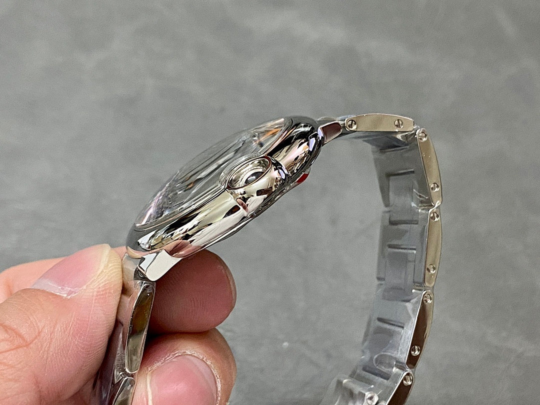 Cartier automatic wristwatch with stainless steel case, side profile view