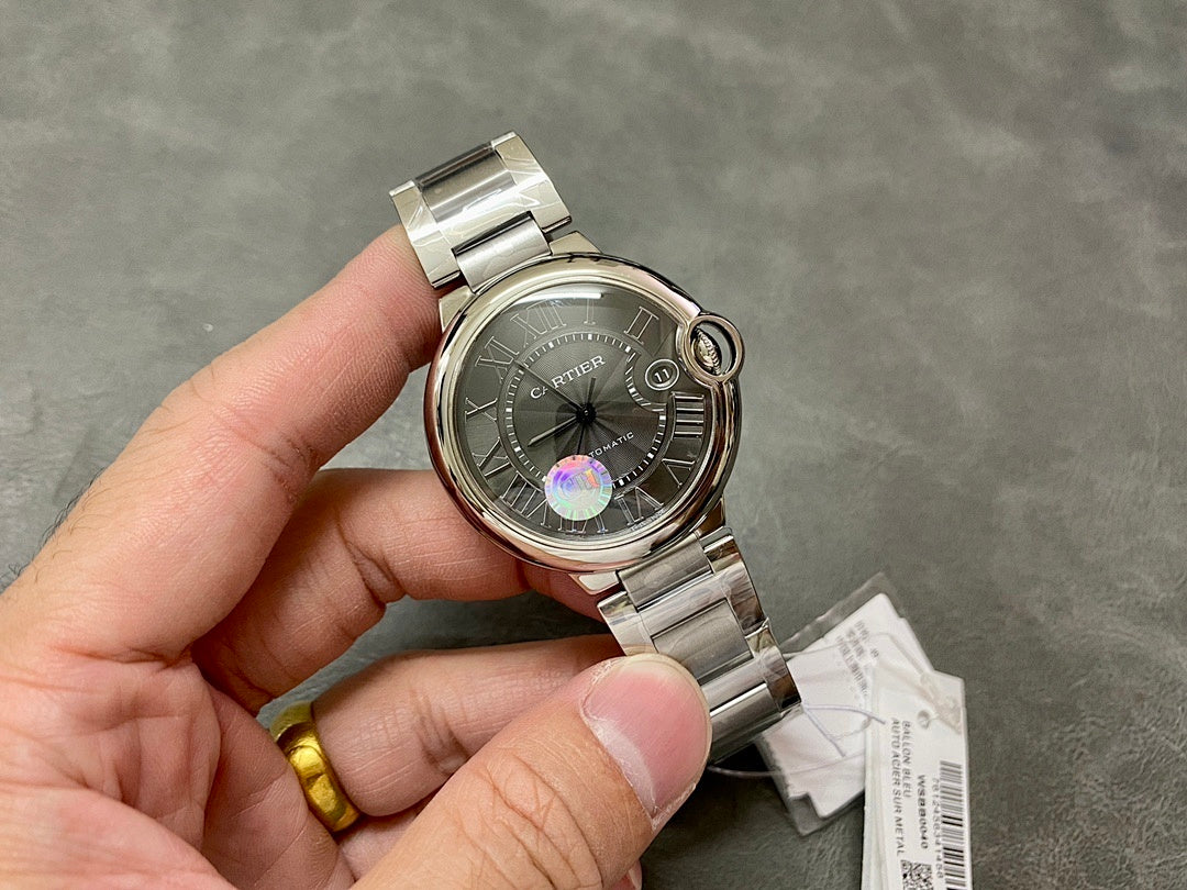 Cartier automatic wristwatch with stainless steel bracelet, gray dial and crown at right
