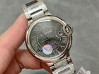 Cartier automatic wristwatch front view, stainless steel bezel and gray Roman numeral dial