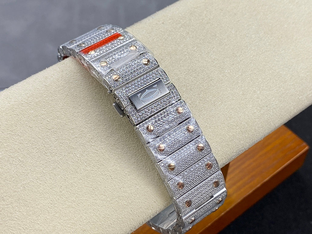 Cartier watch with studded strap and jeweled rectangular case, red strap accent