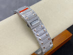 Cartier watch with studded strap and jeweled rectangular case, red strap accent