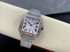 Cartier watch with silver-tone dial, Roman numerals, jeweled case, metal strap