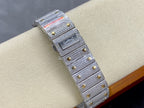 Cartier watch with gray jeweled strap, gold-toned rectangular case, side angle