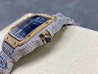 Cartier watch side view with blue dial, gold-toned crown, glittering silver strap