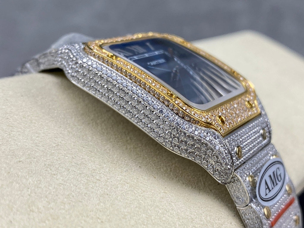 Cartier watch angled view with blue dial, gold bezel trim, gray diamond strap