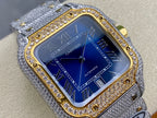 Cartier watch close-up with blue dial, “AUTOMATIC” text, gold bezel rim, gray strap