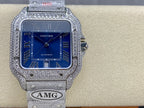 Cartier diamond watch with blue dial, Roman numerals, and silver link bracelet strap