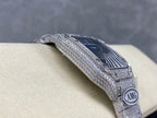 Cartier diamond watch side profile with blue dial and silver textured bezel, crown visible