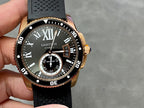 Gold-tone dive watch with black dial, Roman numerals, and subdial indicators on strap
