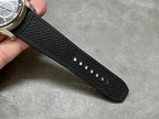 Cartier rubber watch strap with raised texture and metal buckle, black