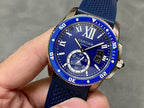 Blue dive-style watch with Roman numerals, subdials, and textured silicone strap