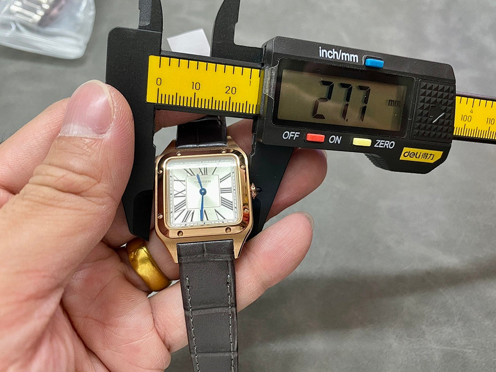 Cartier wristwatch measured with calipers: rose gold square case, white Roman numeral dial, black leather strap