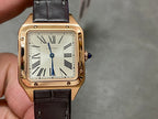 Cartier wristwatch: rose gold square case, white Roman numeral dial, blue hands, black leather strap