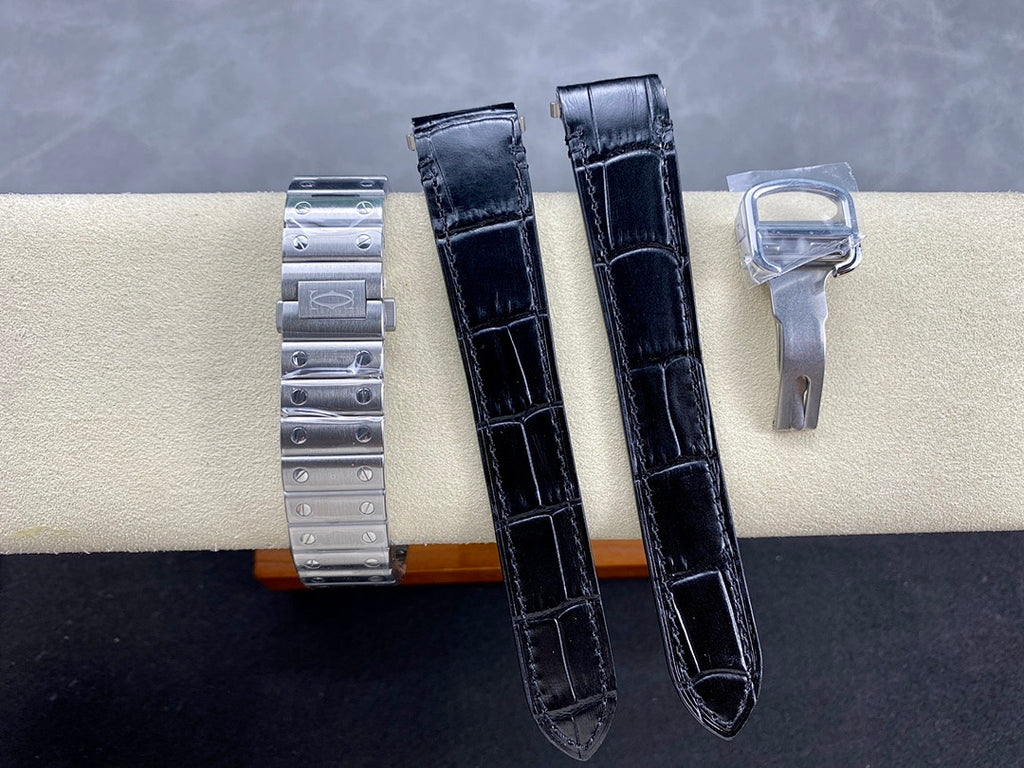 Stainless steel watch case with black leather straps and matching clasp hardware
