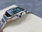 Stainless steel watch head with green dial and blue crown jewel detail
