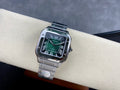 Cartier watch with green dial and stainless steel bracelet, rectangular black bezel