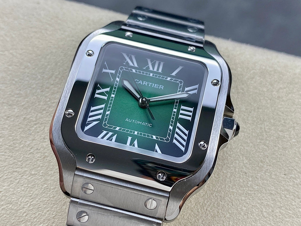 Stainless steel wristwatch with green dial and Roman numerals, front close-up