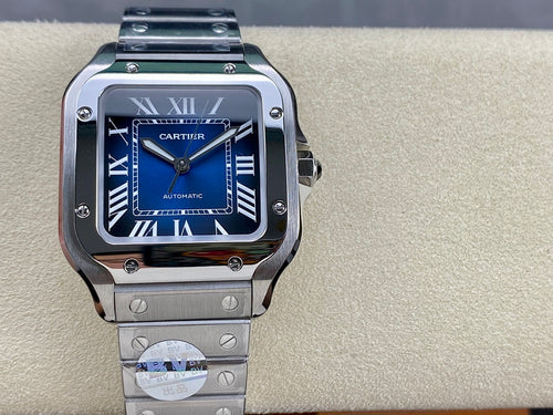 Cartier wristwatch with blue dial, Roman numerals, and steel bracelet, automatic text visible