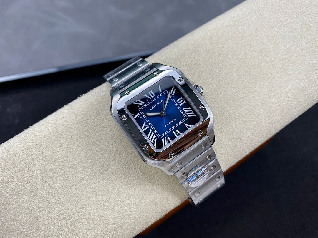 Cartier wristwatch three-quarter view with blue dial, Roman numerals, and steel bracelet