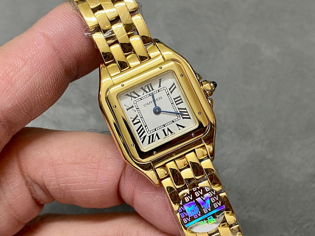 Gold-tone Cartier wristwatch front view with Roman numerals and blue-toned accents