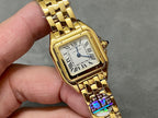 Gold-tone Cartier wristwatch front view with Roman numerals and blue-toned accents