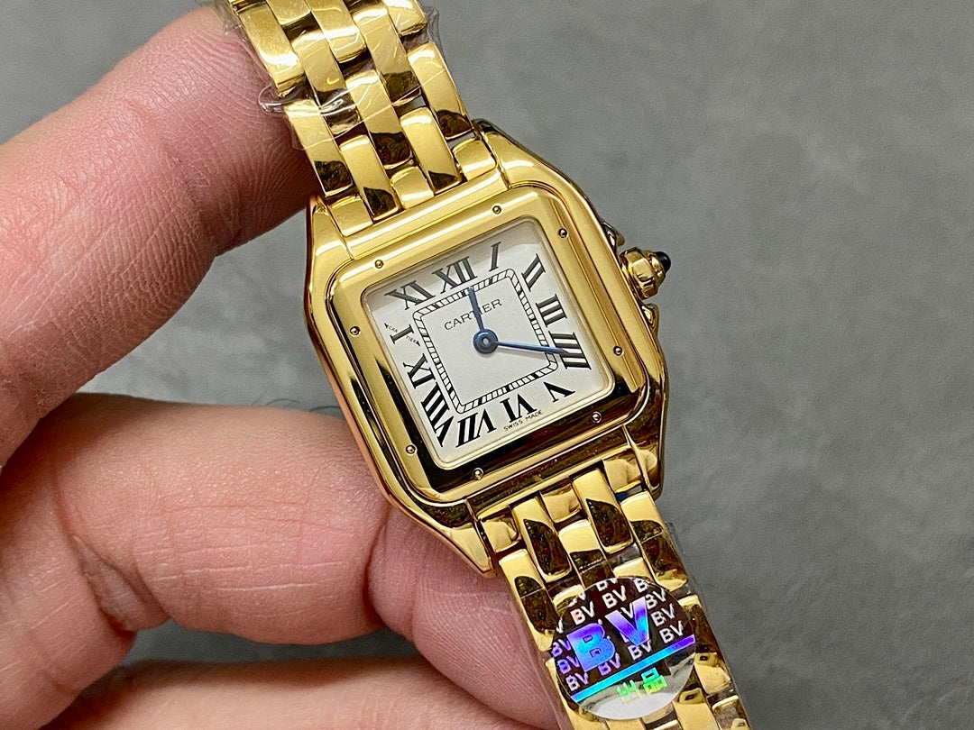 Gold-tone Cartier wristwatch front view with Roman numerals and blue-toned accents
