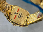 Cartier watch case back with engraved markings and Swiss cross emblem