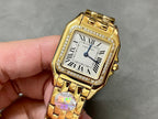 Cartier watch with square gold case, Roman numeral dial, and gold link bracelet