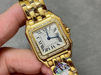 Cartier watch close-up: square gold bezel with stone detail and Roman numeral dial