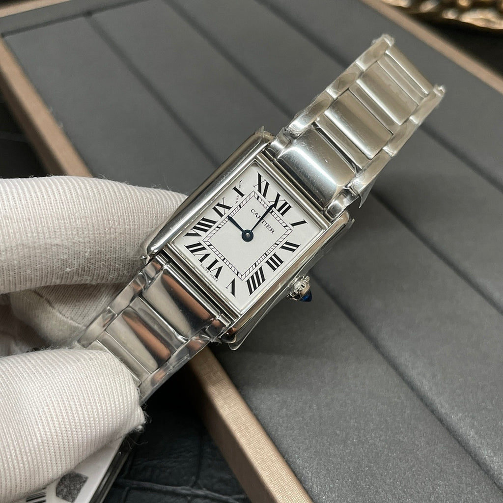 Cartier watch with silver-tone bracelet and white dial, Roman numeral markers