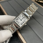 Cartier watch with silver-tone bracelet and white dial, Roman numeral markers