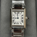 Cartier watch with silver-tone rectangular case, white dial, Roman numerals