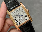 Cartier watch close-up: rose-gold case, white dial with Roman numerals, black strap