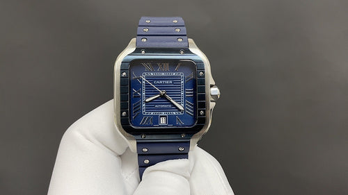 Cartier watch with blue dial, blue leather strap, silver-toned case