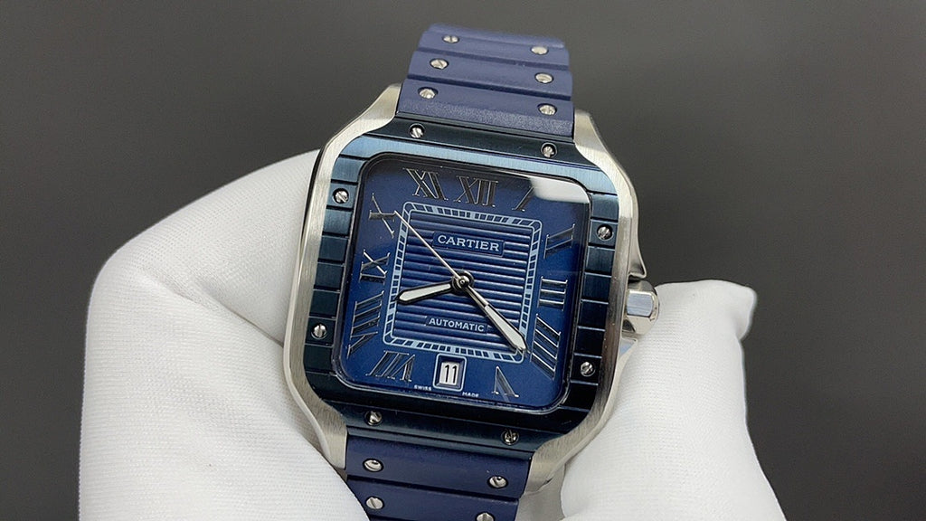 Cartier watch front view with blue dial, roman numerals, and blue strap