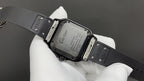 Cartier black strap wristwatch with open caseback and engraved markings
