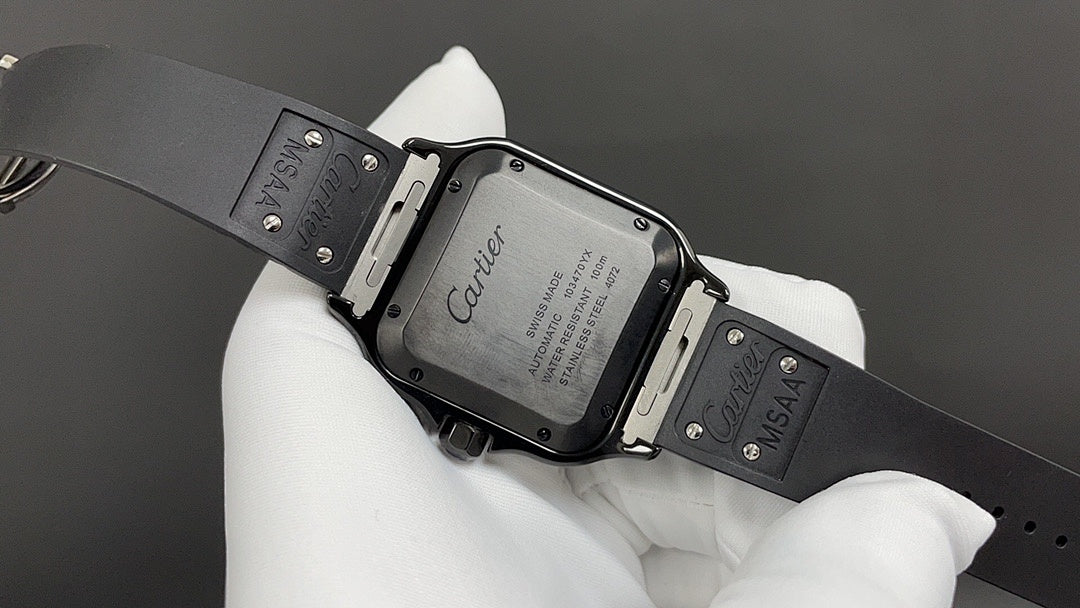 Cartier black strap wristwatch with open caseback and engraved markings