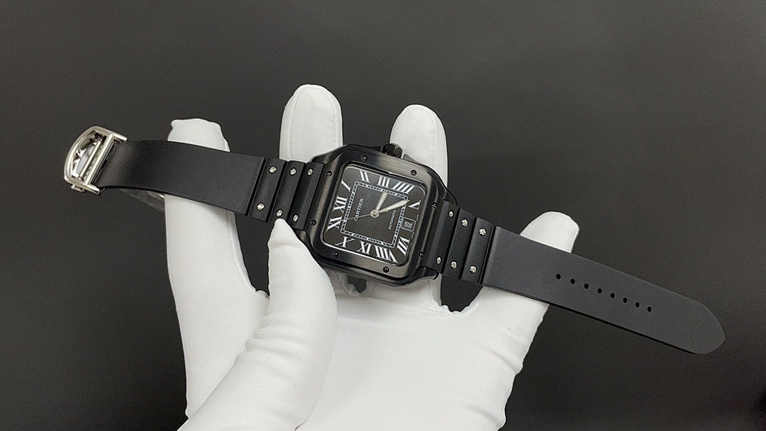 Cartier black strap wristwatch with Roman numerals, buckle and clasp visible