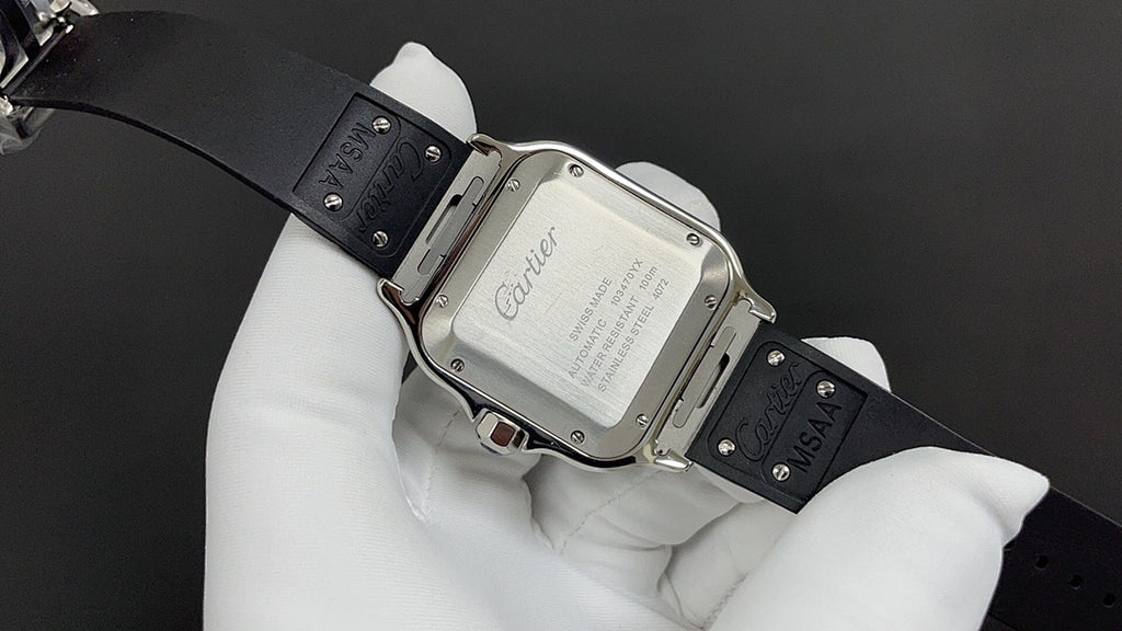 Cartier wristwatch with silver case and black leather strap, clasp and strap holes.