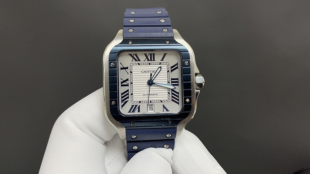 Cartier watch with blue dial, Roman numerals, and blue leather strap